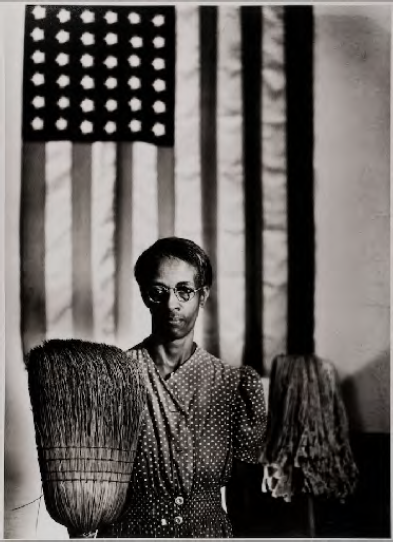 Gordon Parks (American, 1912–2006), American Gothic, Washington, D.C., 1942, printed later, gelatin silver print, 18-1/4 x 13-1/8 inches. Palmer Museum of Art, purchased with funds provided by the Friends of the Palmer Museum of Art, 99.32